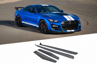 A blue Ford Mustang GT500 with the Shelby Style Side Skirt Kit installed on it, displayed on a road surface.