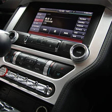 Car dashboard with a navigation system and control buttons